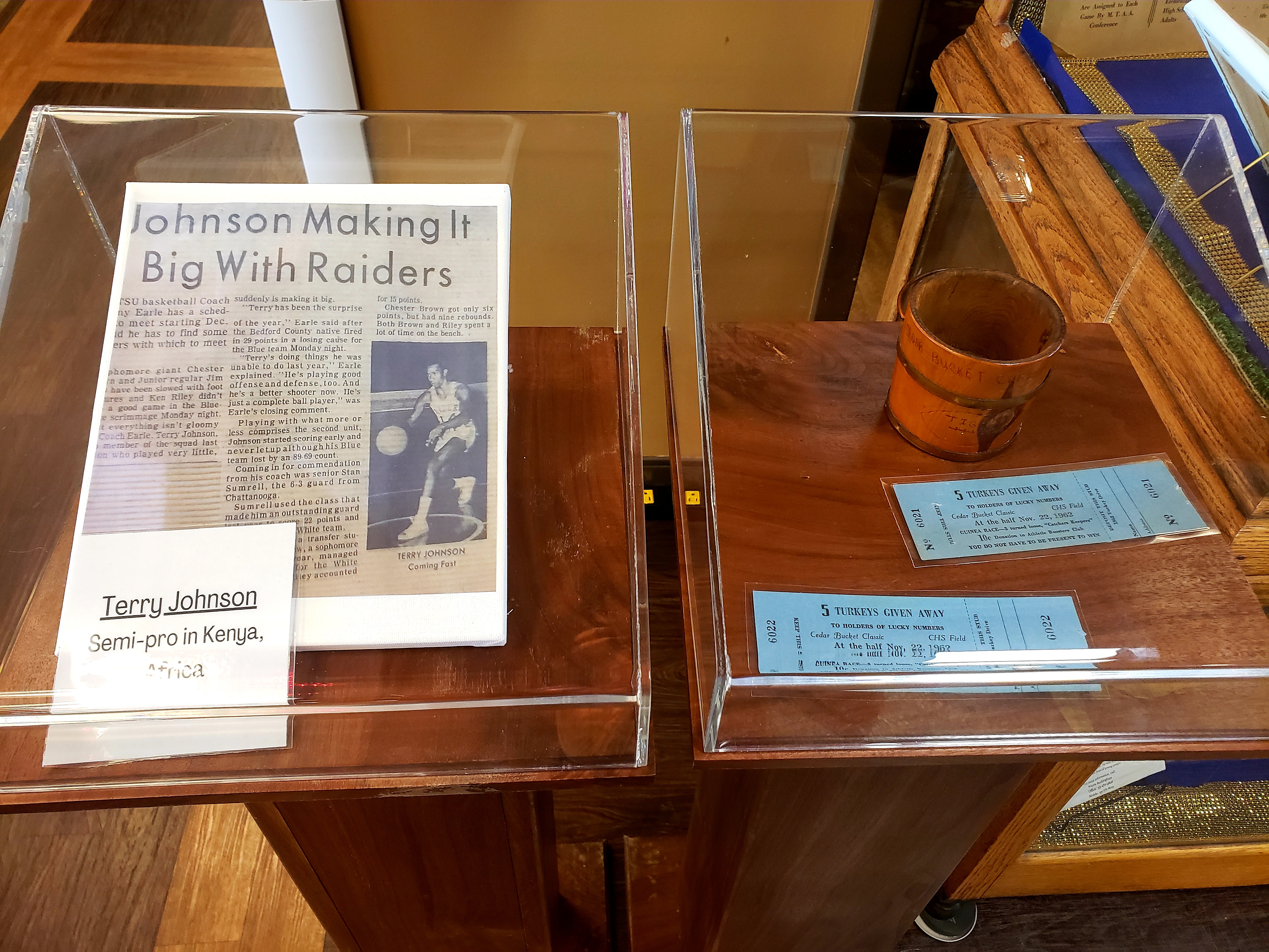 Left: Article covering Terry Johnson, who went on to play semi-pro basketball in Kenya. Right: The cedar bucket was used as the symbol for an annual football game between Bedford County Training School and Holloway High School in Murfreesboro.